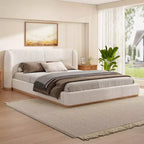 Base de cama con respaldo de ala tapizada en bouclé moderno