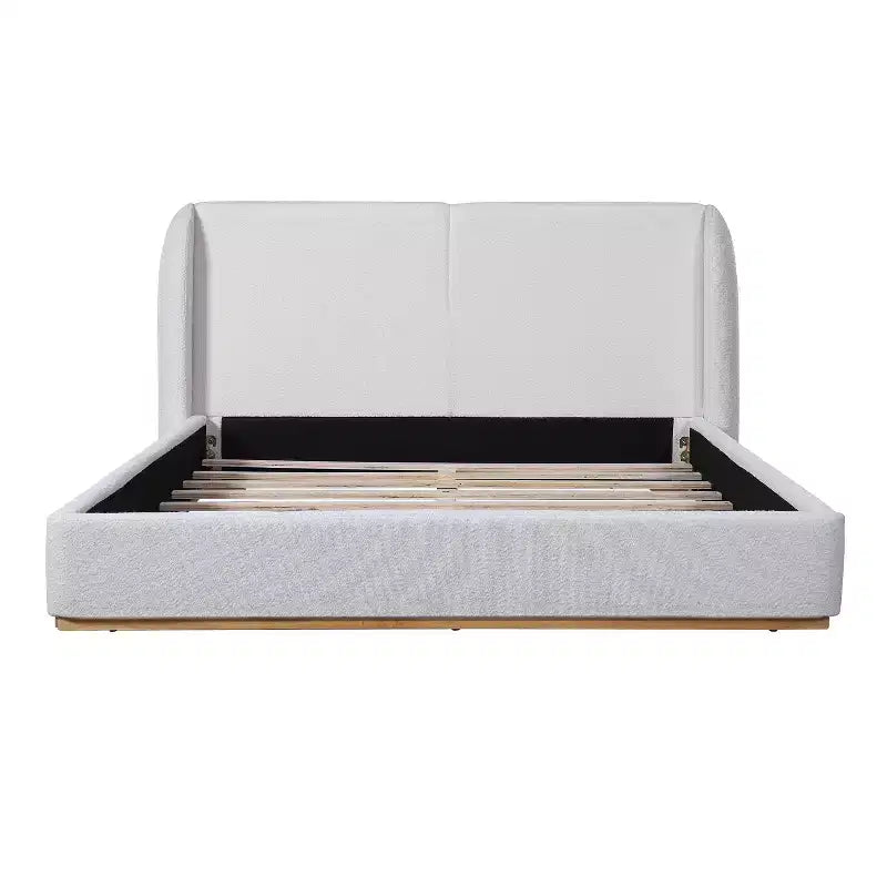 Base de cama con respaldo de ala tapizada en bouclé moderno