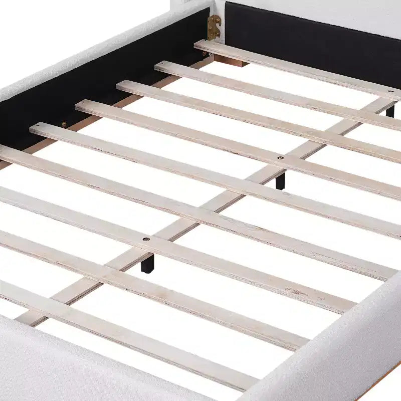 Base de cama con respaldo de ala tapizada en bouclé moderno